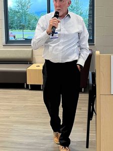 Lee Stroupe, Chair of Nominations, conducts the election of new board members